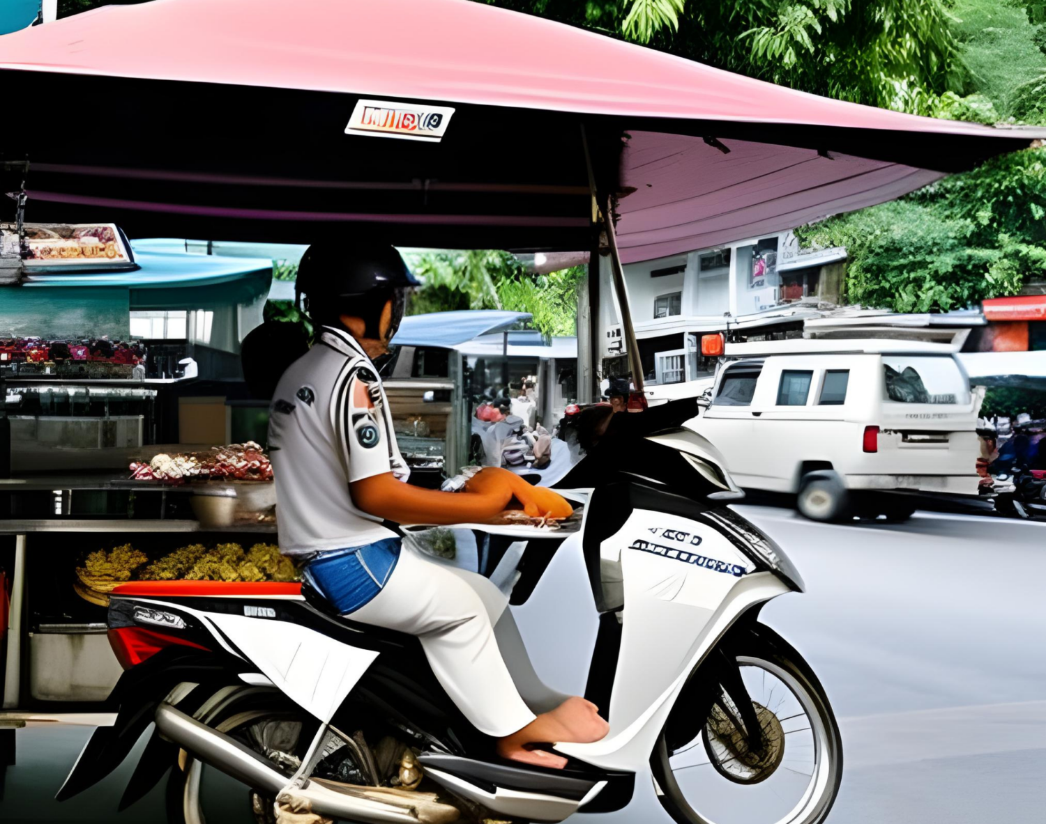 Man on motorbike in front of food stall