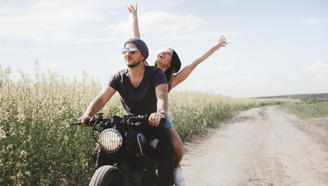 Couple having a good time on motorcycle